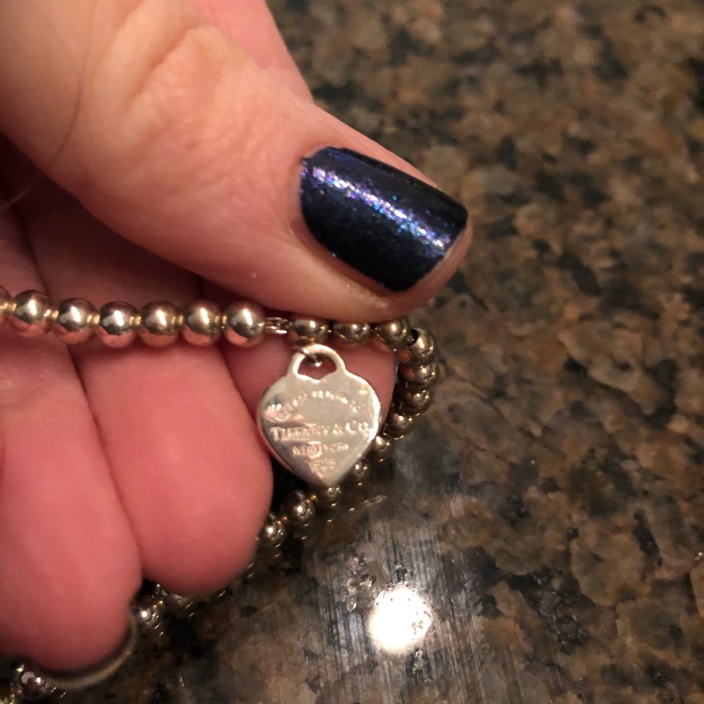 Tiffany & Co. Silver bracelet with a pink heart